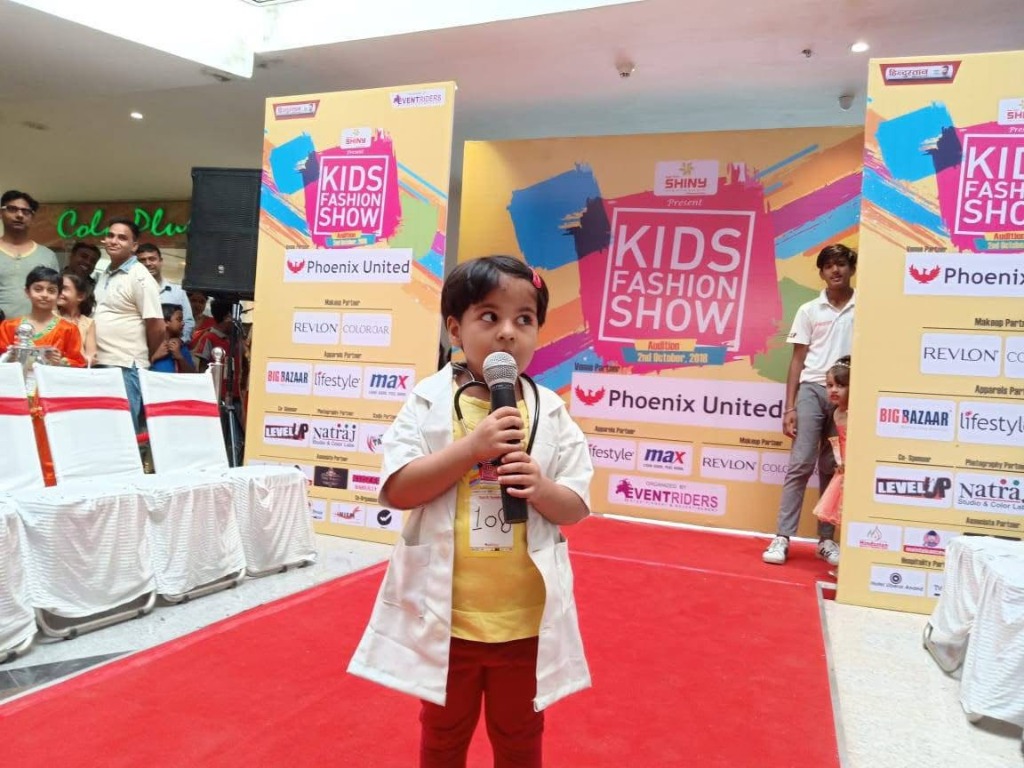 Toddler dressed as doctor on red carpet at Phoenix United Bareilly
