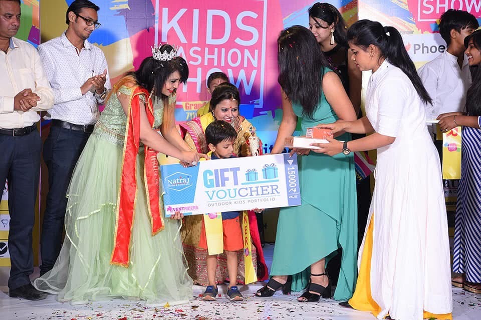 Grand stage felicitation with ₹15,000 gift voucher at Phoenix United Bareilly