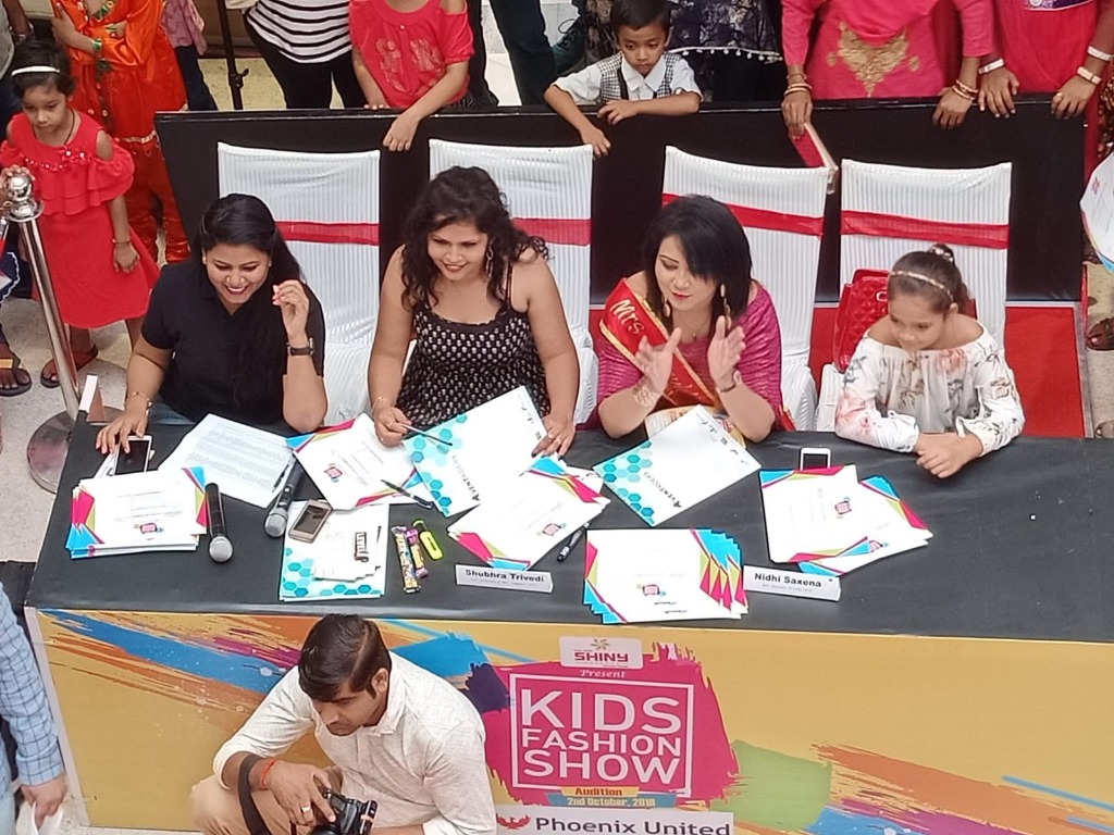 Eminent jury panel evaluating contestants at Phoenix United Bareilly