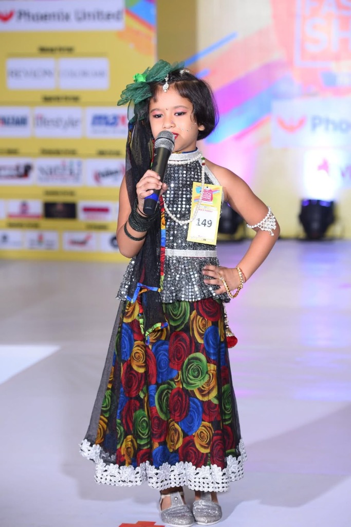 Young girl ramp walk with microphone at Phoenix United Bareilly