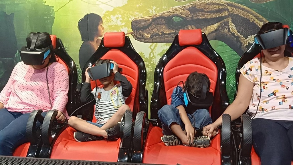 Kids and parents enjoying 4D VR dynamic rides at Phoenix United Bareilly